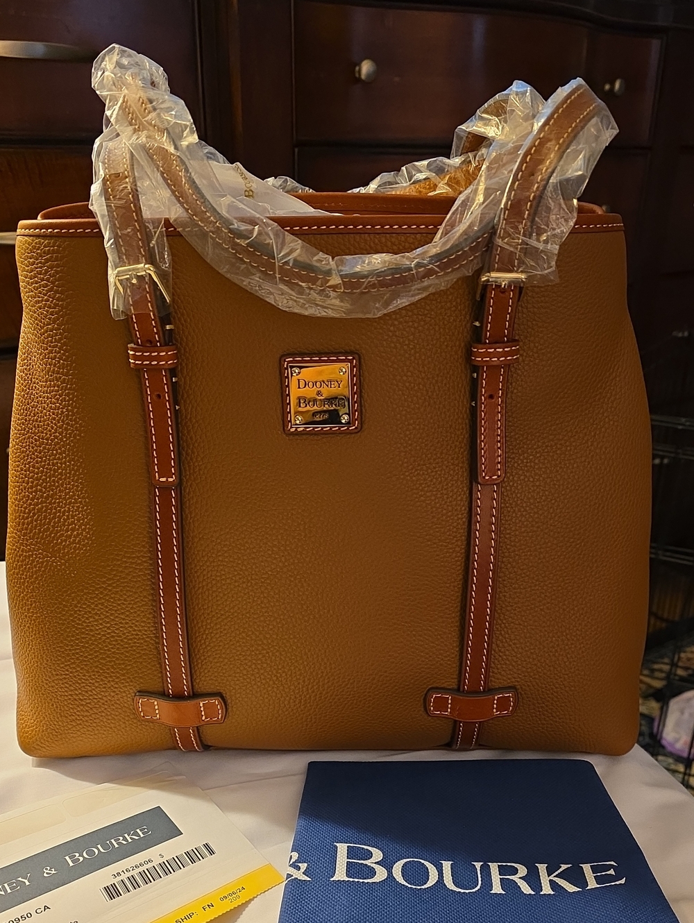 Dooney & Bourke Luxurious Pebbled Leather adjustable Tote with Contrast Trim